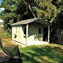 10 x 12 high board and batten with a 4 foot gable porch.